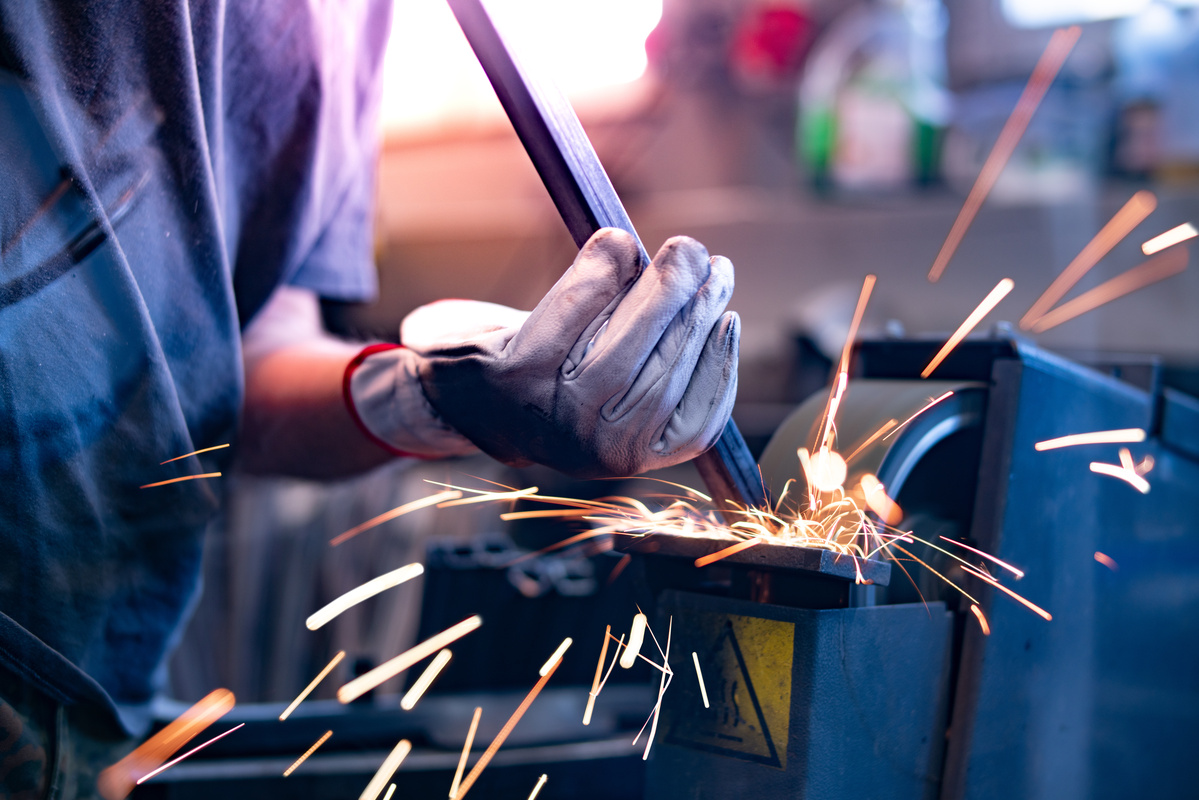 Team of metal welders and metal carpenters